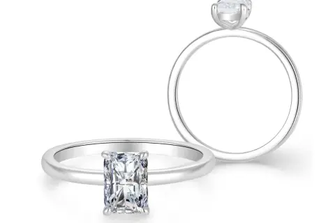 Zwei Ringe mit Diamanten: ein Ring mit einem rechteckigen Diamanten, der die Frage "wie viel ist 1 karat diamant wert" aufwirft, und ein weiterer Ring mit einem runden Diamanten.