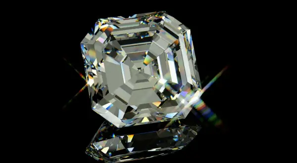Ein geschliffener Diamant mit vielen Facetten, der das Licht in allen Farben bricht. Man fragt sich, wie viele Facetten hat ein Brillant, um solch ein Funkeln zu erzeugen.