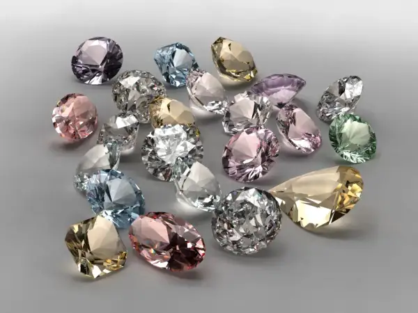 Bunte Edelsteine, was ist wertvoller als Diamant? Ein Haufen funkelnder, geschliffener Juwelen in Rosa, Blau, Grün und Gelb.